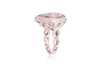A MORGANITE AND DIAMOND RING