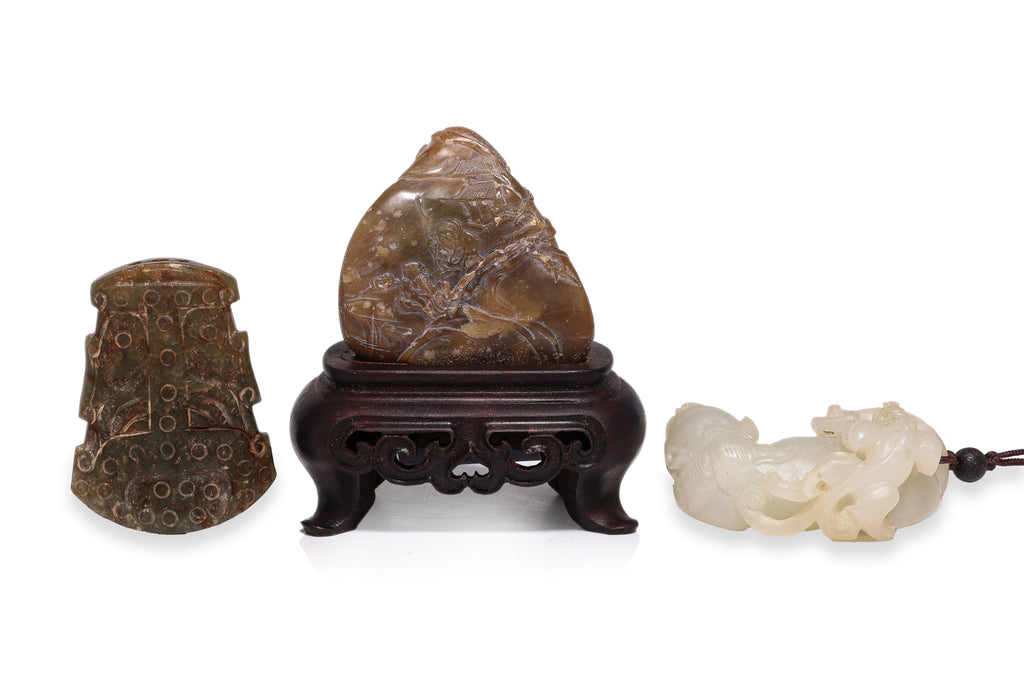 A GROUP OF THREE STONE CARVINGS