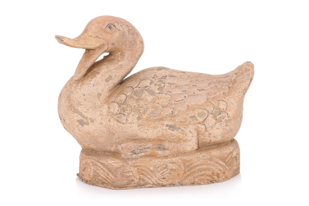 A PAINTED POTTERY MODEL OF A DUCK