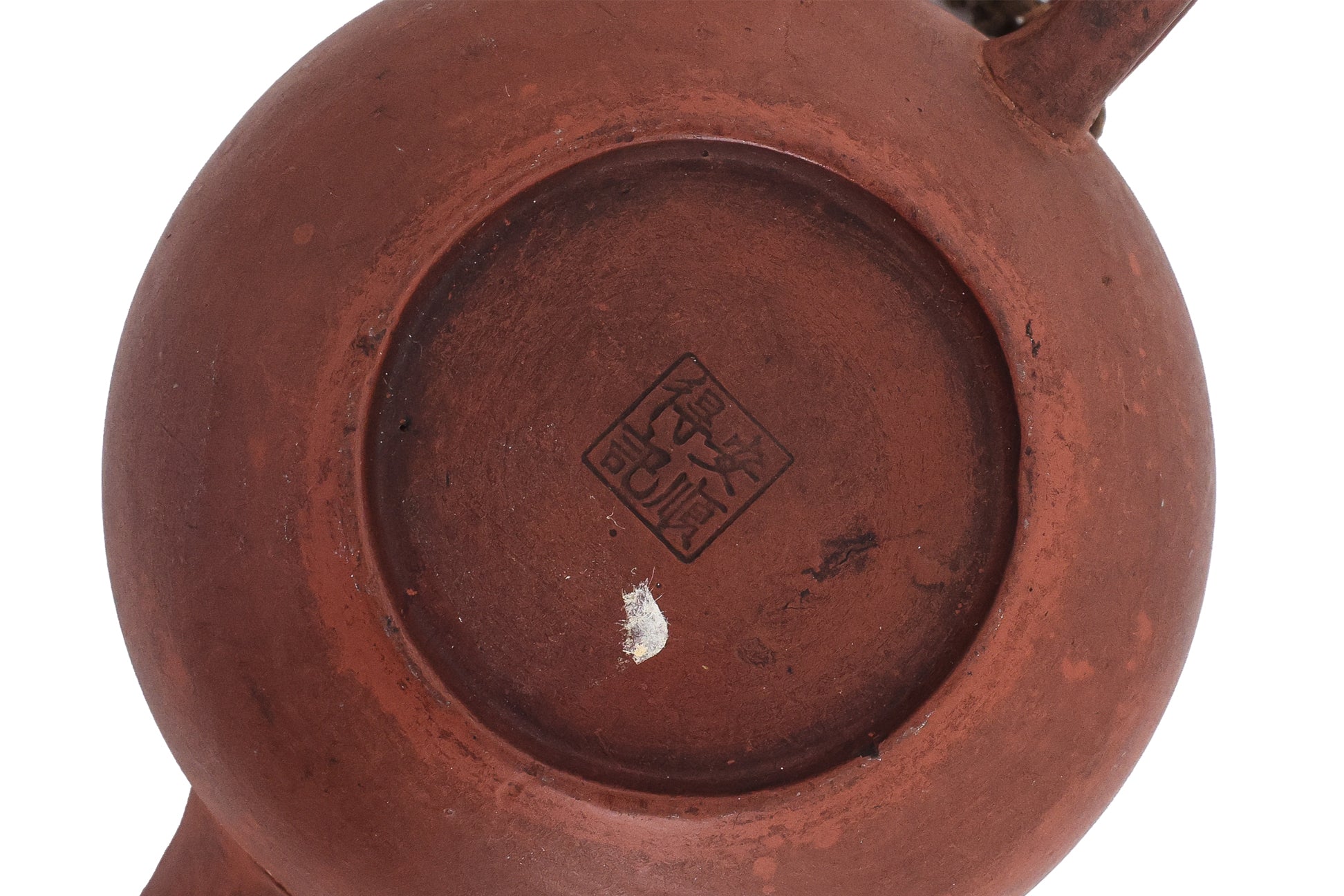 A YIXING POTTERY TEAPOT AND COVER
