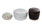 A GROUP OF THREE CIRCULAR BOXES WITH COVERS