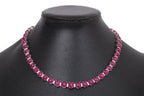 A LEAD GLASS FILLED RUBY AND DIAMOND NECKLACE