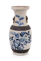 A LARGE NANKING BLUE AND WHITE BIRD AND FLOWER DECORATED VASE