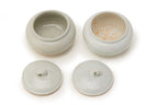 TWO QINGBAI GLAZED POTS AND COVERS