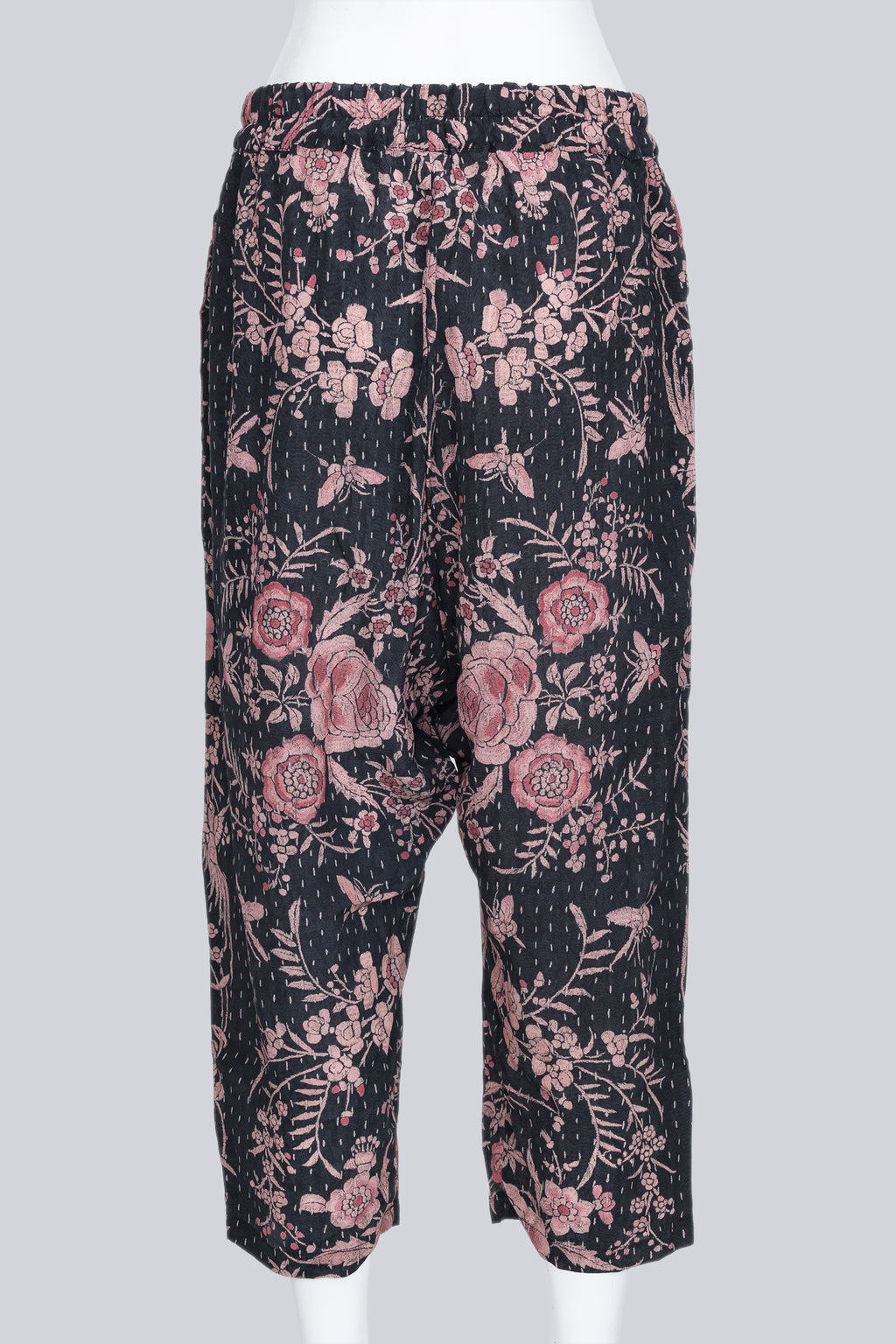 BY WALID - A PAIR OF BLACK AND PEACH FLORAL PRINT DROP CROTCH GAUCHOS