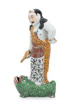 A FAMILLE ROSE PORCELAIN FIGURE OF LIU HAI