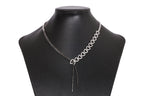 A DIAMOND AND BLACK DIAMOND TWO TONE 'RIBBON' NECKLACE
