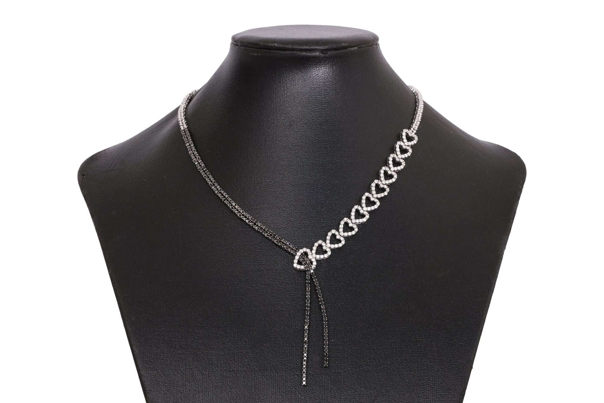 A DIAMOND AND BLACK DIAMOND TWO TONE 'RIBBON' NECKLACE