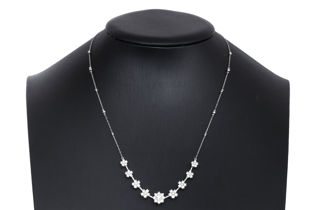 A DIAMOND 'FLOWER' CLUSTER NECKLACE