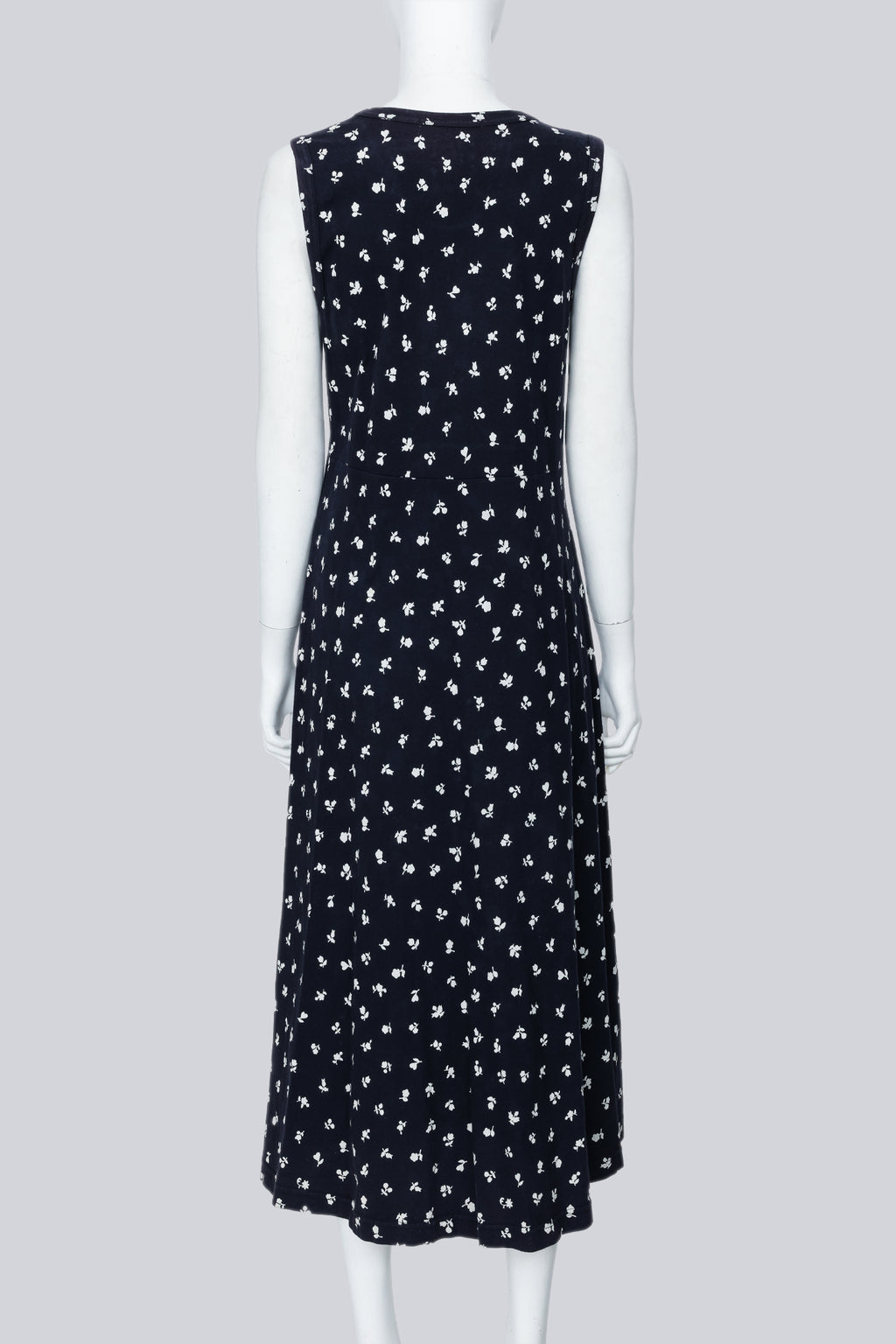 COMME DES GARCONS - A NAVY DRESS WITH A WHITE FLORAL PATTERN