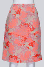 CAROLINA HERRERA - AN ORANGE FLORAL SKIRT