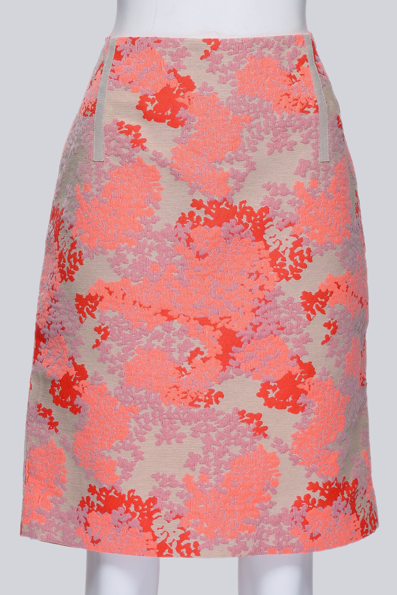 CAROLINA HERRERA - AN ORANGE FLORAL SKIRT