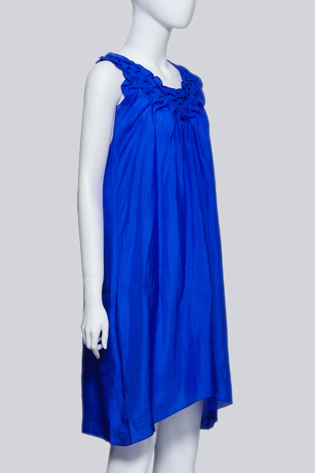 AKIRA – A COBALT BLUE SILK DRESS WITH RUFFLED NECKLINE