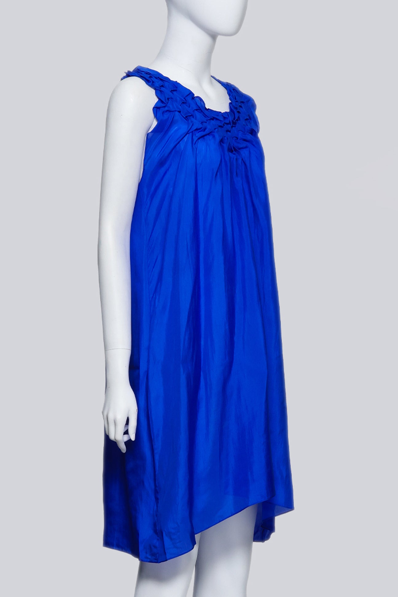 AKIRA – A COBALT BLUE SILK DRESS WITH RUFFLED NECKLINE