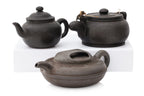A GROUP OF SIX YIXING ZISHA POTTERY TEAPOTS