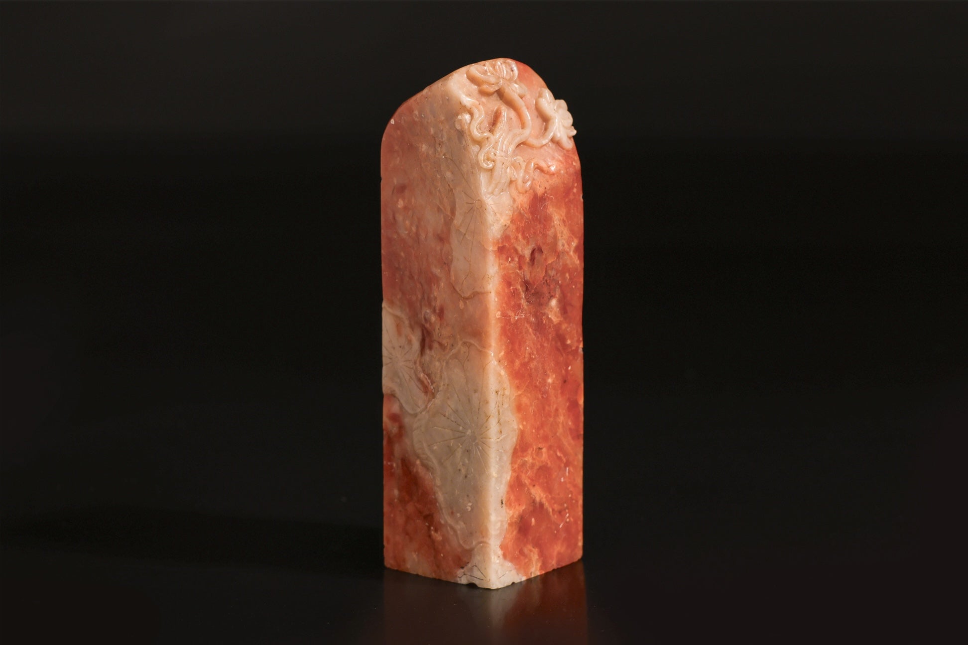 A CARVED SOAPSTONE 'LOTUS' SEAL