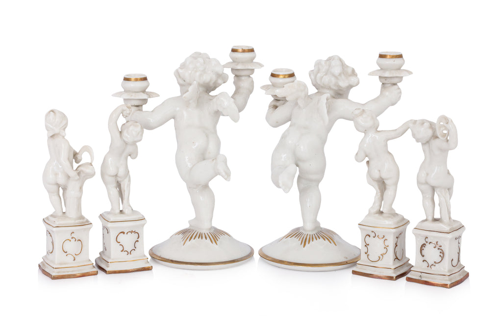 A GROUP OF SIX HUTSCHENREUTHER PORCELAIN FIGURES OF CHERUBS