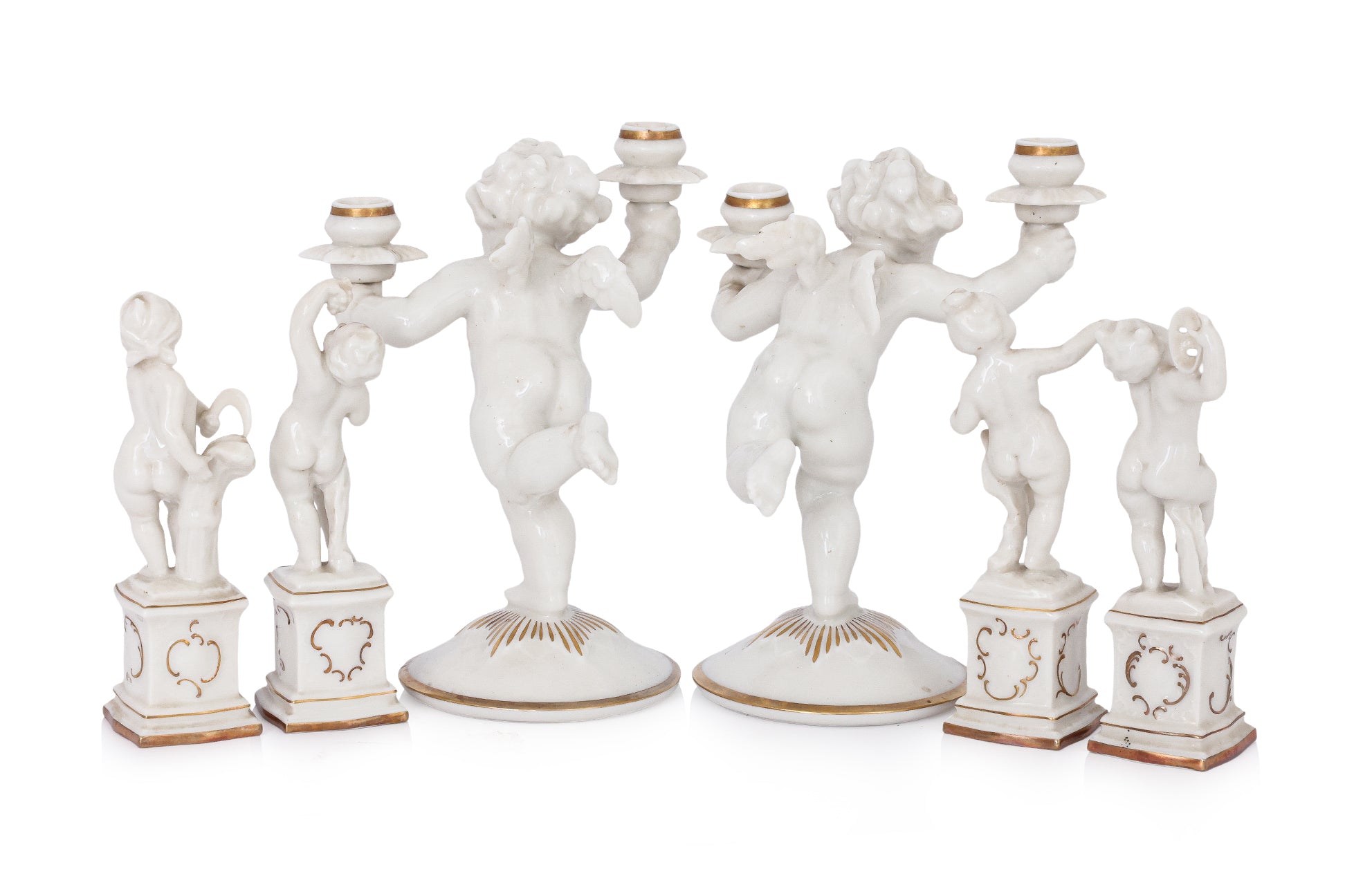 A GROUP OF SIX HUTSCHENREUTHER PORCELAIN FIGURES OF CHERUBS