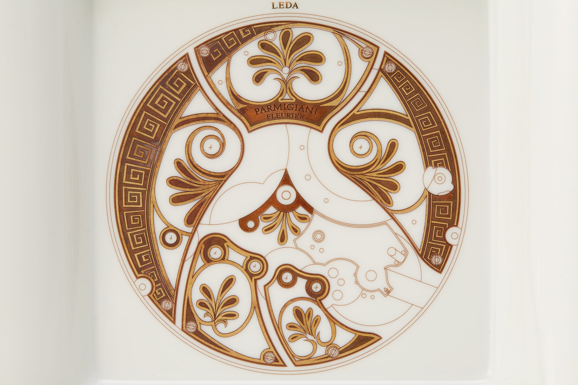 A LIMOGES 'PARMIGIANI FLEURIER' COMMEMORATIVE DISH