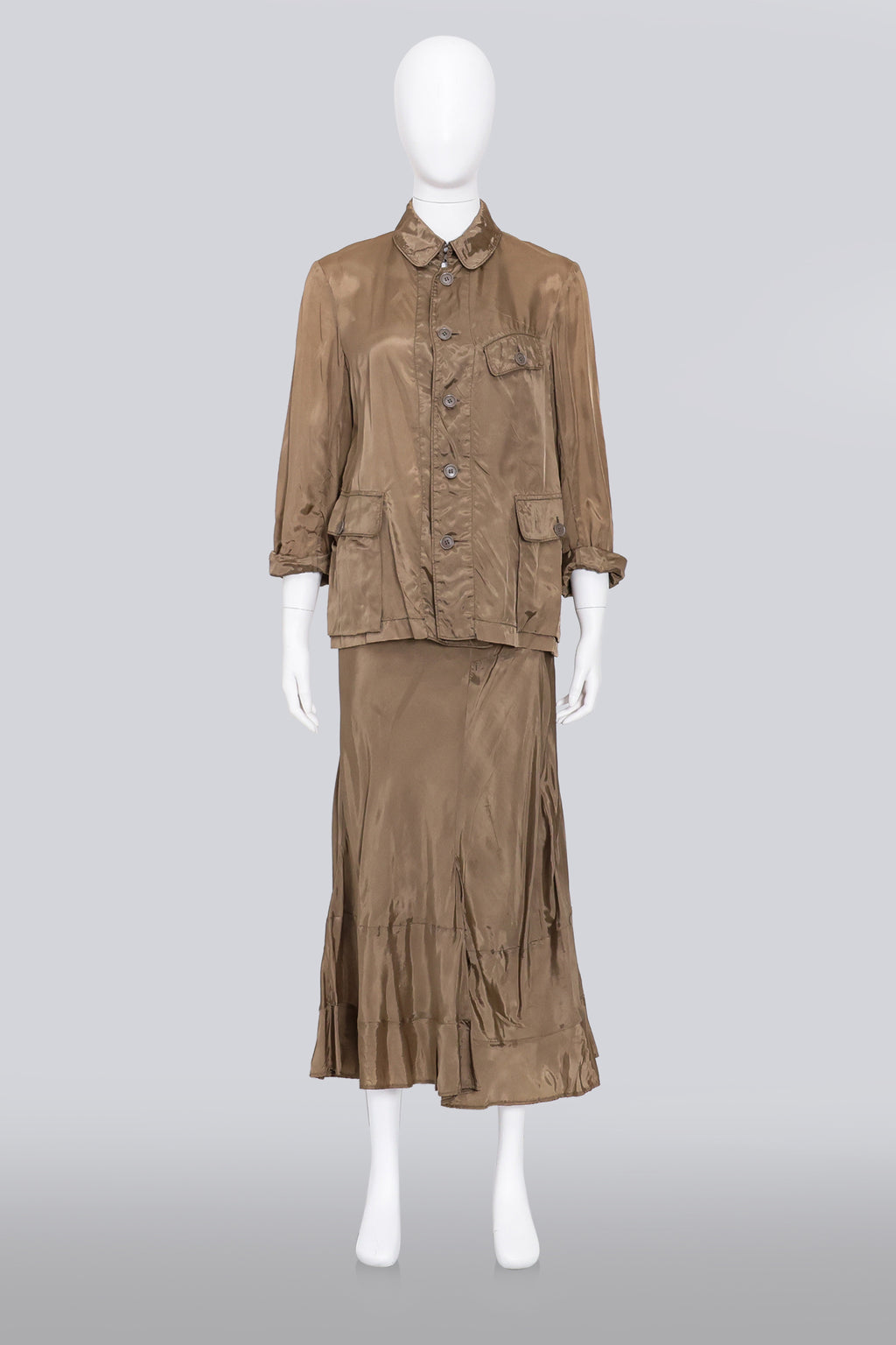 COMME DES GARCONS - AN AGED BRONZE UTILITY BLOUSE AND MATCHING SKIRT SET