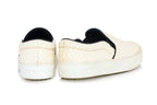 CELINE – A PAIR OF WHITE PYTHON SLIP-ON SNEAKERS