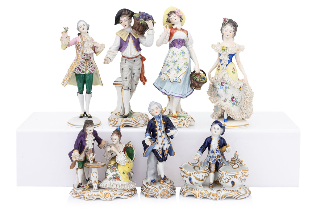 A GROUP OF SEVEN VOLKSTEDT PORCELAIN FIGURES