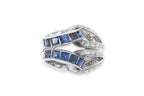 A SAPPHIRE AND DIAMOND RING