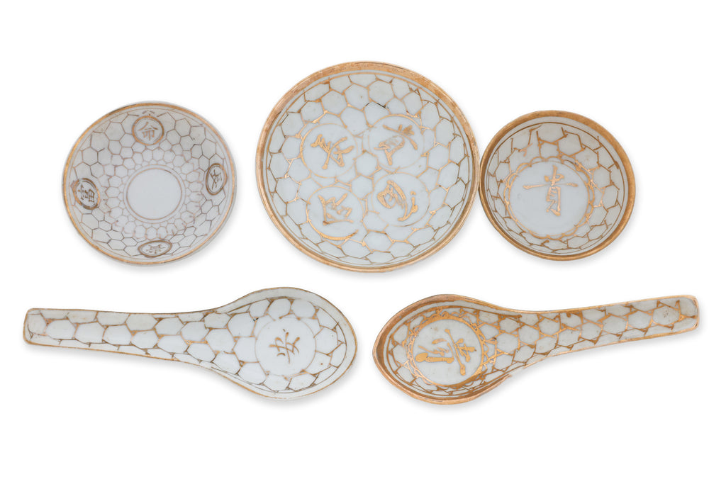 A HARLEQUIN WHITE AND GOLD DINNER SET