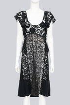 PRADA - A 2008 BLACK COTTON BLEND HEAVY LACE APPLIQUE PANELLED DRESS