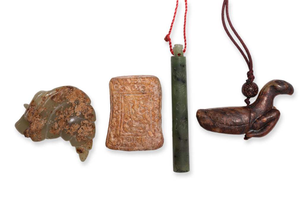 A GROUP OF FOUR JADE CARVINGS