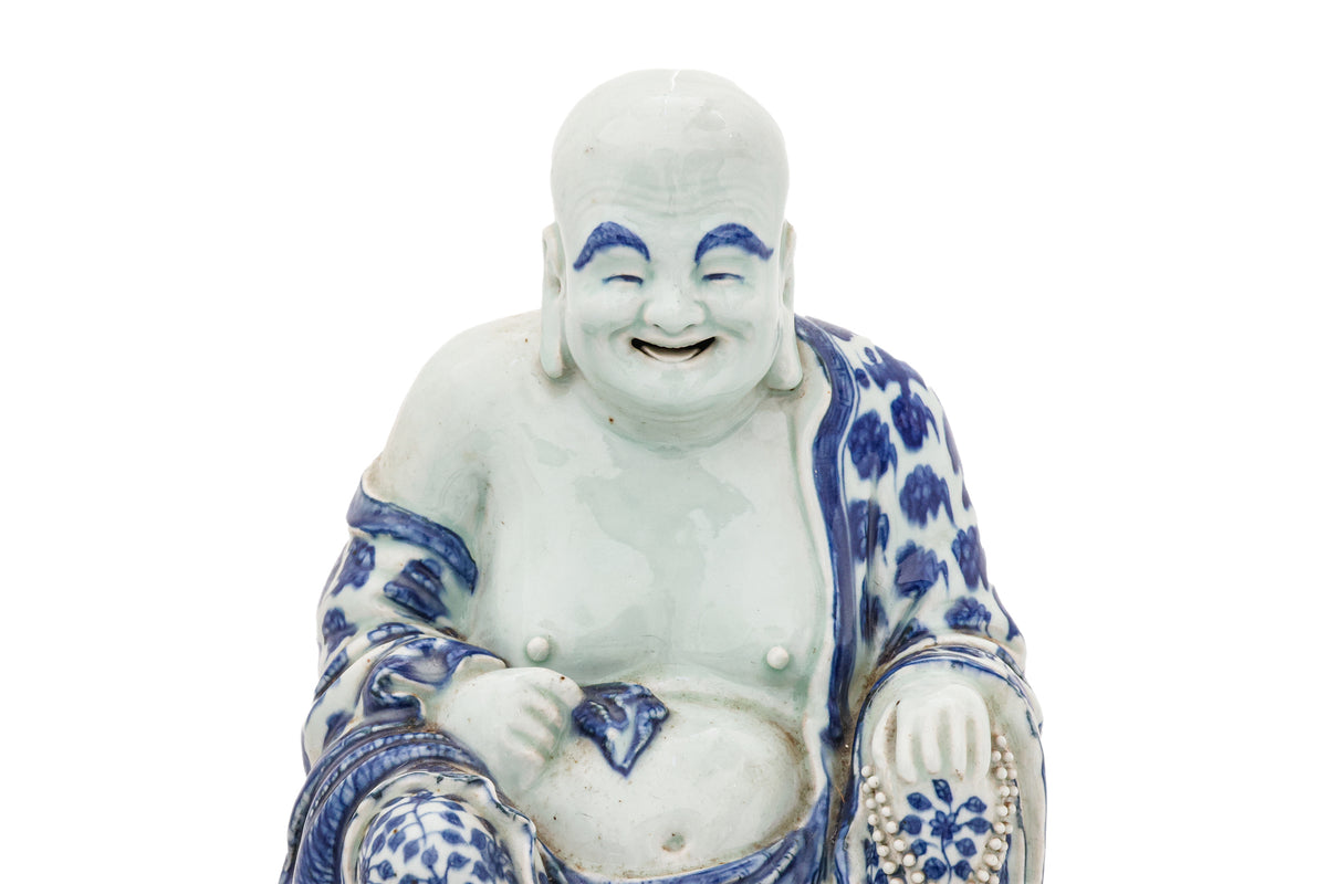 A LARGE PORCELAIN FIGURE OF BUDAI