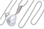 A LARGE BAROQUE SOUTH SEA PEARL AND DIAMOND PENDANT ON CHAIN