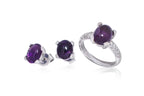 AN AMETHYST AND DIAMOND RING WITH MATCHING EARRINGS