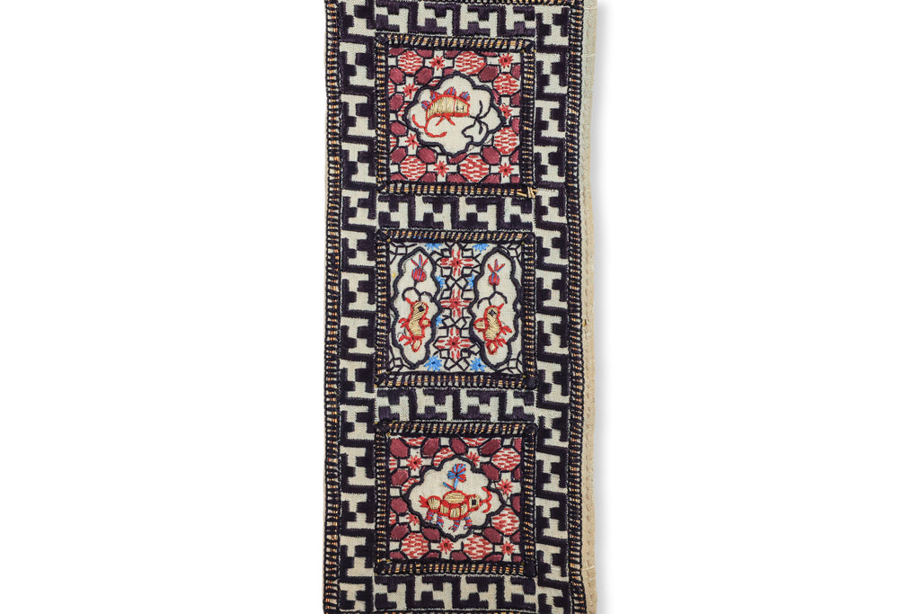 AN EMBROIDERED SILK BED HANGING