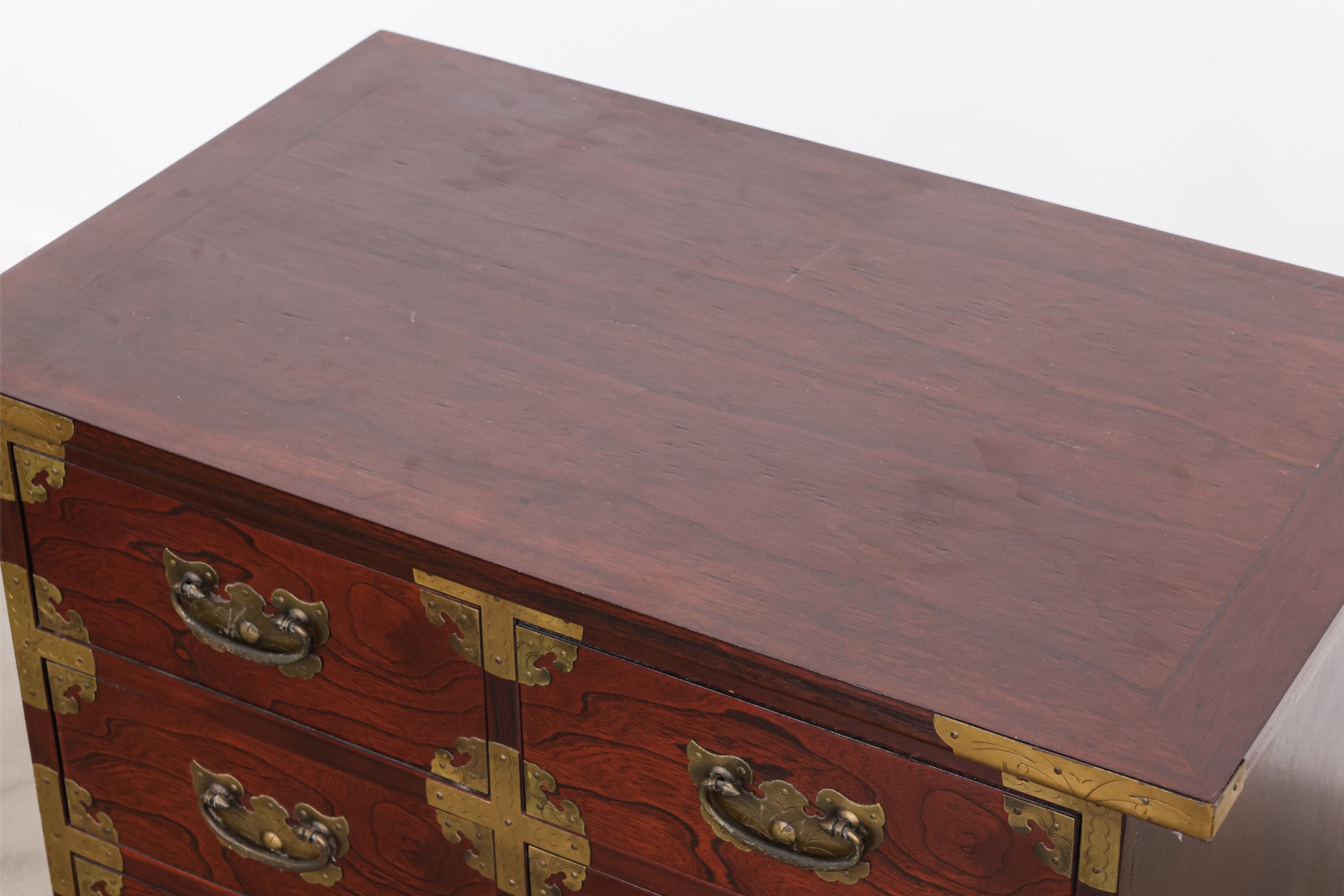 A KOREAN ELM CHEST OF DRAWERS