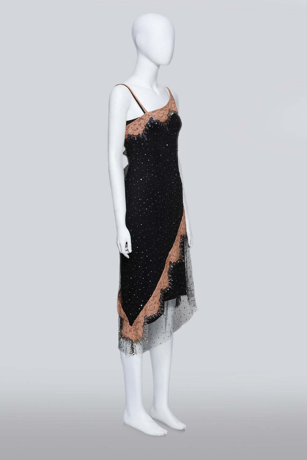 COLLETTE DINNIGAN - A BLACK MESH OVERDRESS WITH SLIP