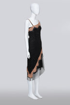 COLLETTE DINNIGAN - A BLACK MESH OVERDRESS WITH SLIP