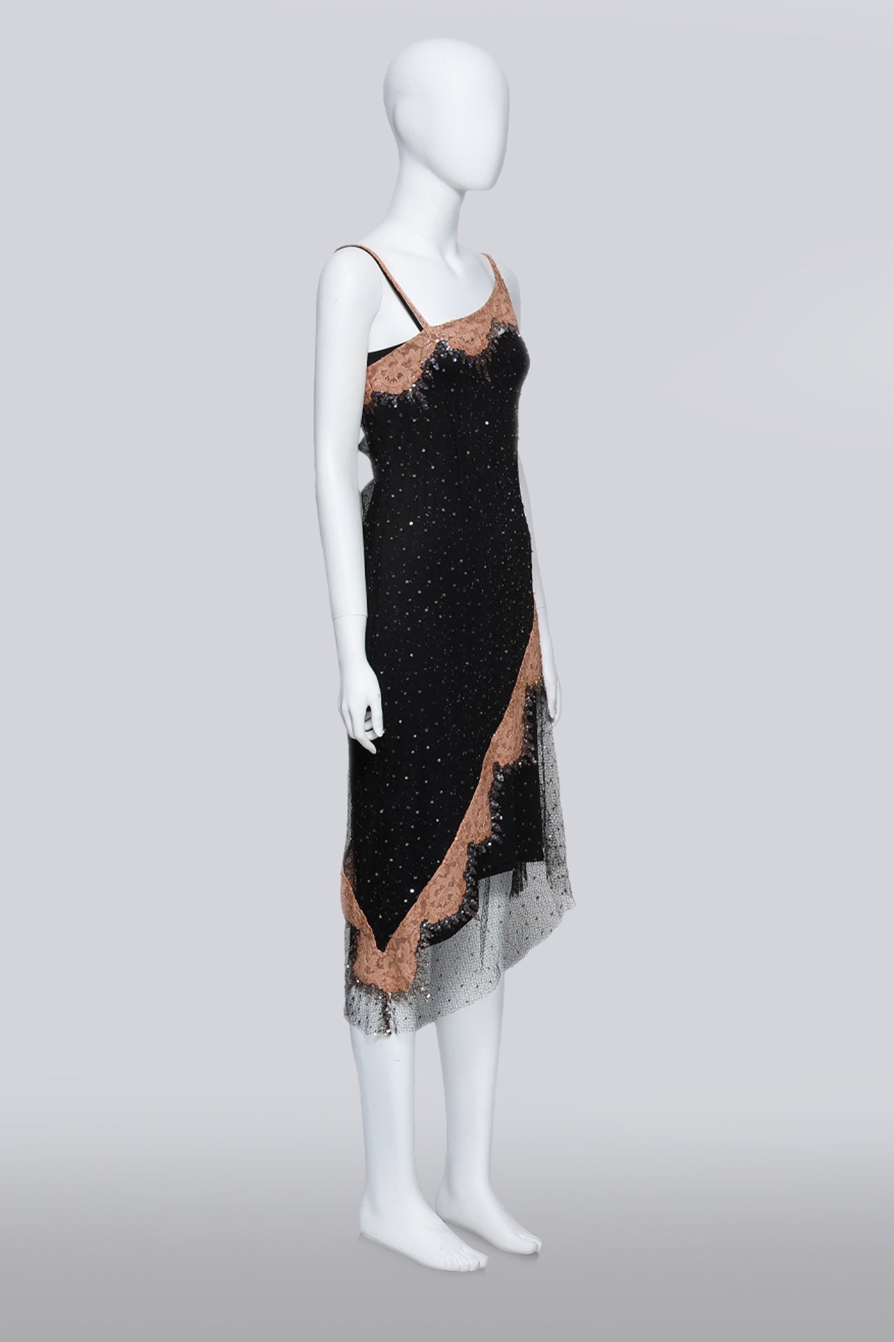 COLLETTE DINNIGAN - A BLACK MESH OVERDRESS WITH SLIP