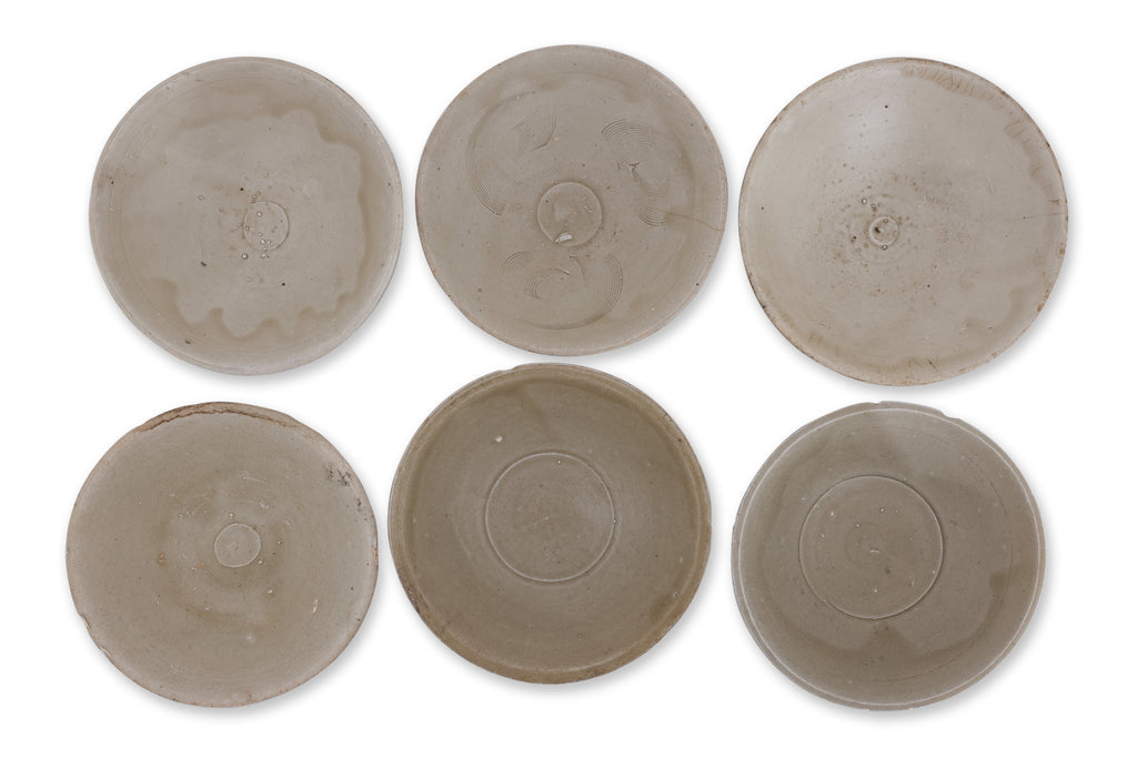 A GROUP OF SIX OLIVE-GREEN GLAZED BOWLS
