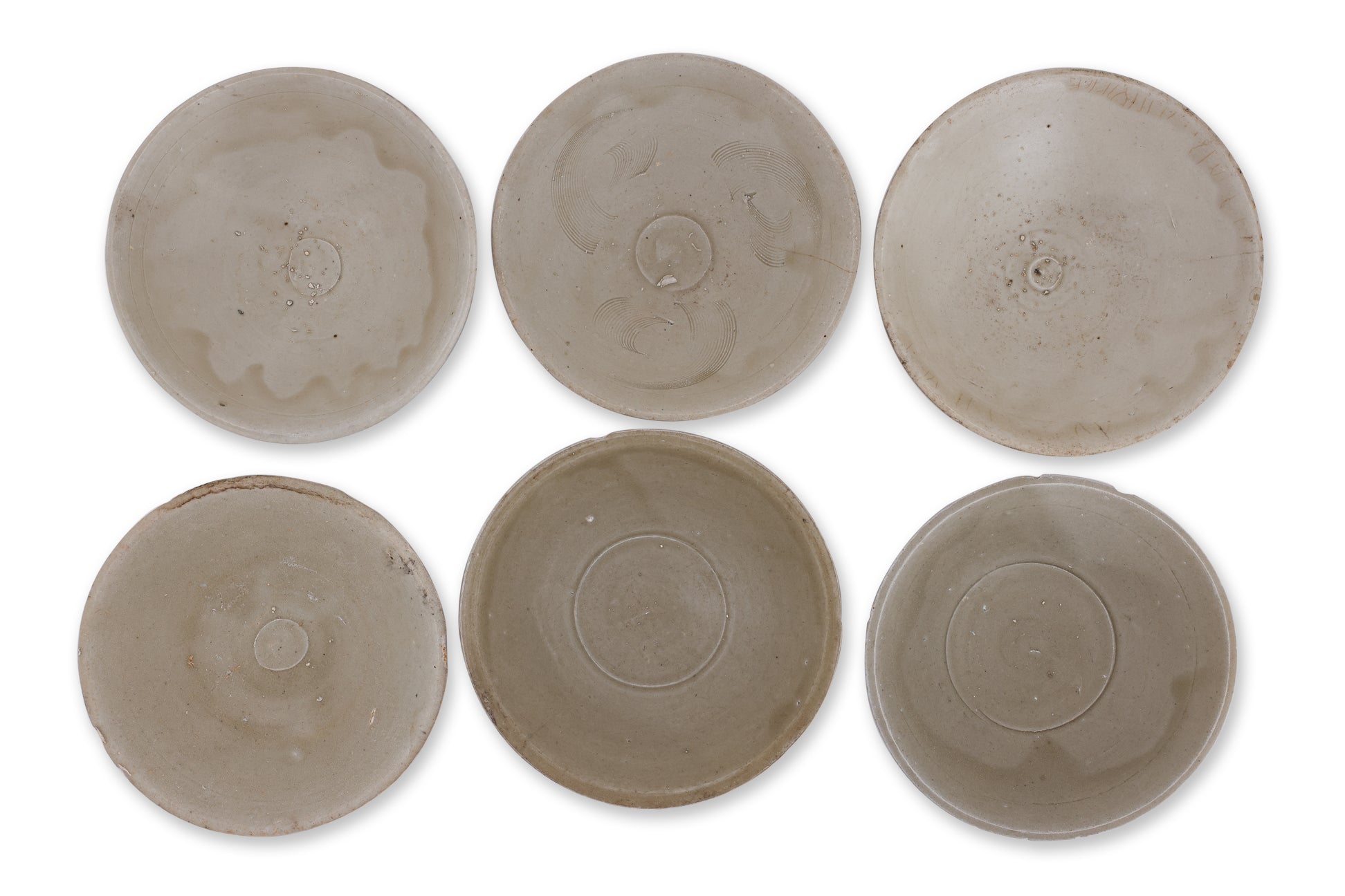 A GROUP OF SIX OLIVE-GREEN GLAZED BOWLS