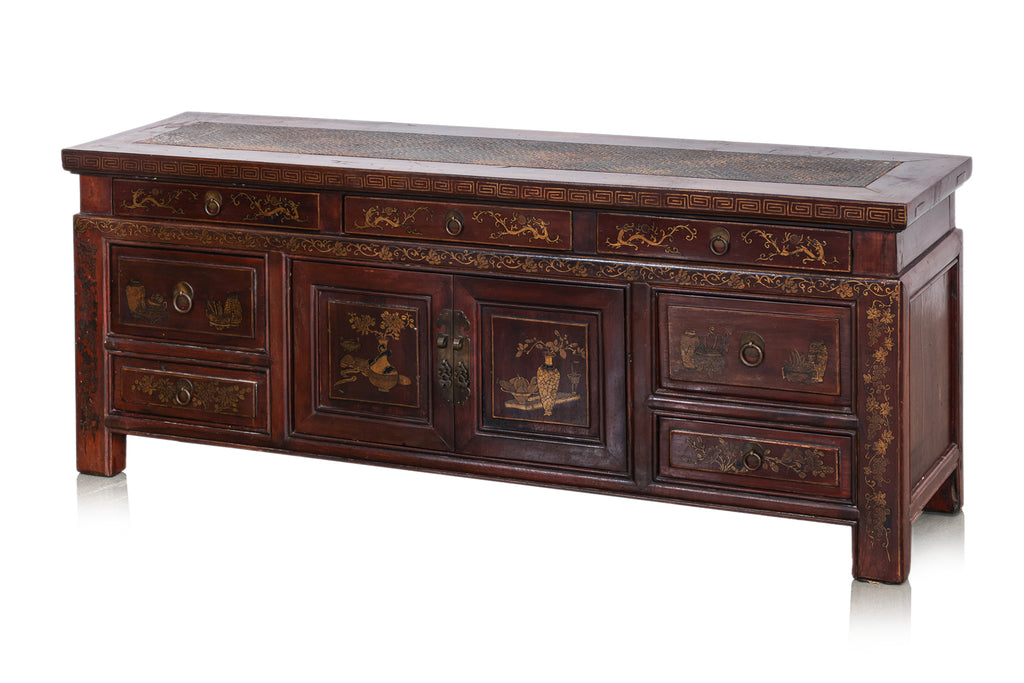 A CHINESE GILT DECORATED LOW CABINET