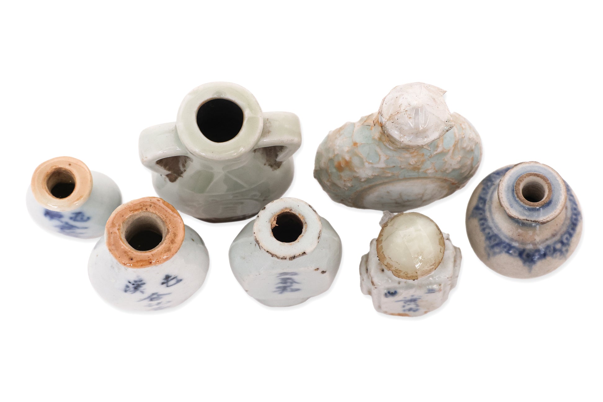 A GROUP OF SEVEN MINIATURE PORCELAIN BOTTLES