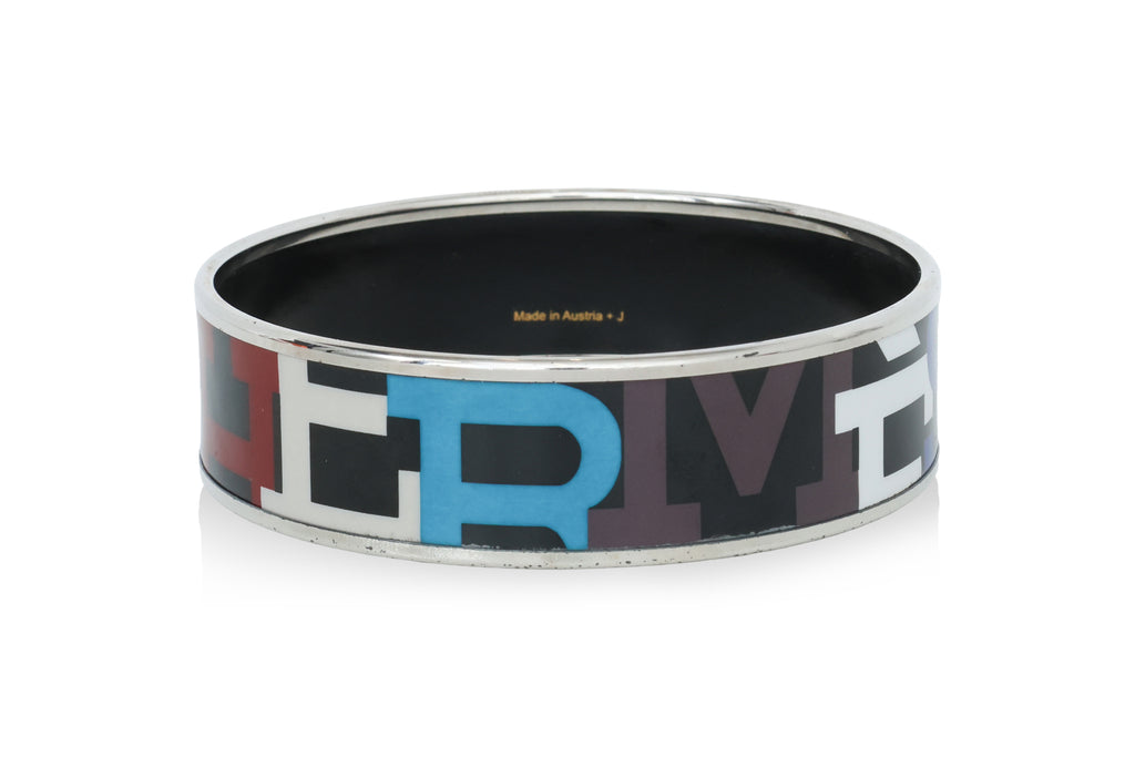 HERMÈS - A 'CAPITALES' ENAMEL BANGLE