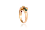 A RUBY, EMERALD AND DIAMOND RING