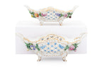 A GROUP OF FOUR DRESDEN PORCELAIN BASKETS