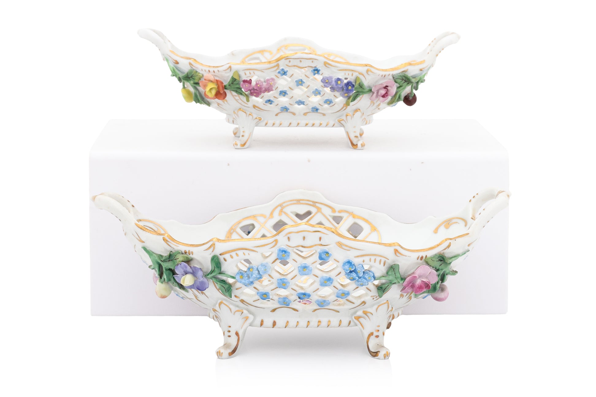 A GROUP OF FOUR DRESDEN PORCELAIN BASKETS