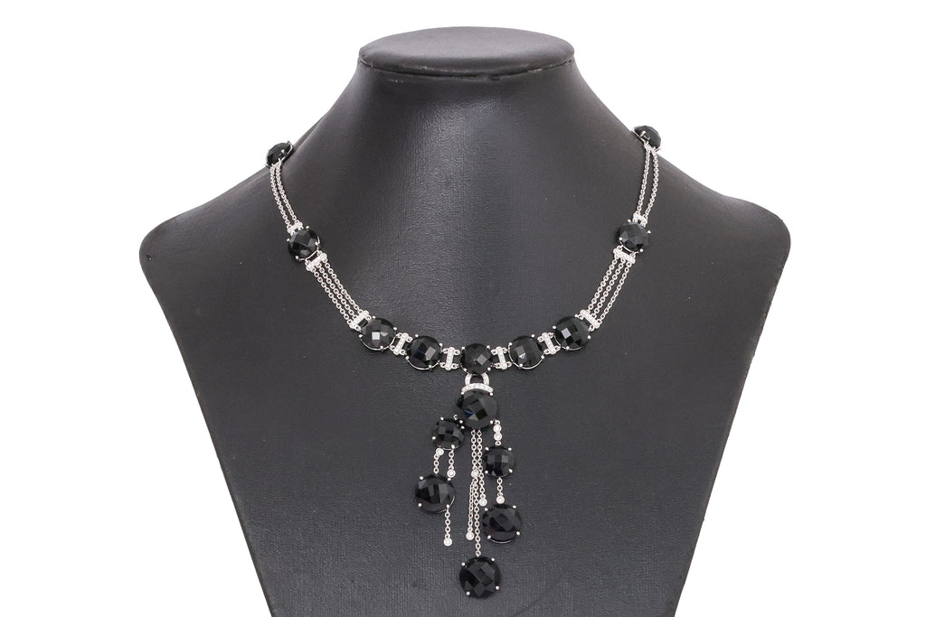 A BLACK JADE AND DIAMOND NECKLACE