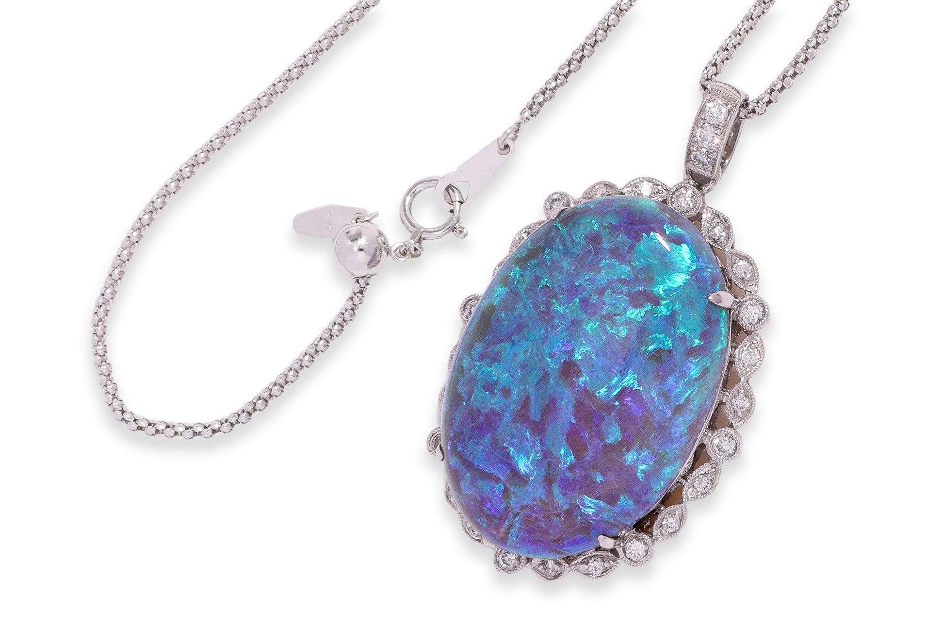 A LARGE OPAL AND DIAMOND PENDANT ON CHAIN