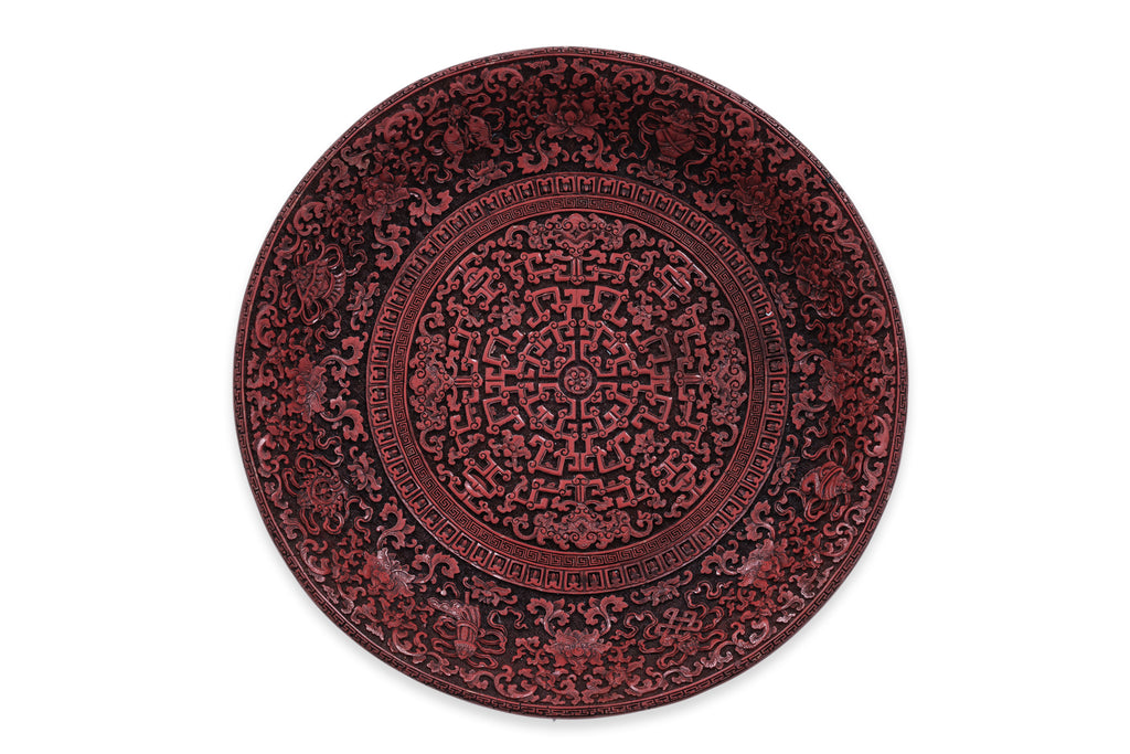 A RED LACQUER STYLE DISH