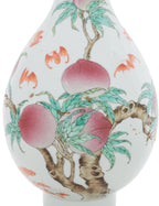 A FAMILLE ROSE 'PEACH AND BAT' BOTTLE VASE